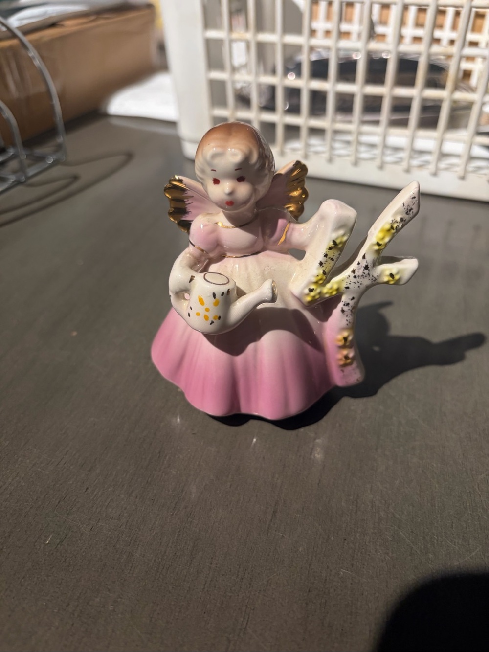 Pink Porcelain Angel Figurine with Gold Accents and Watering Can